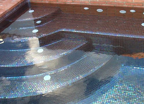 Piscina jacuzzi de obra en Porqueres ( Girona )