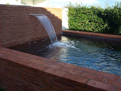 Piscina jacuzzi de obra en Porqueres ( Girona )